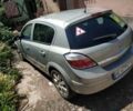 Серый Опель Астра Н, объемом двигателя 1.6 л и пробегом 210 тыс. км за 5500 $, фото 4 на Automoto.ua