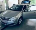 Серый Опель Астра Н, объемом двигателя 1.6 л и пробегом 100 тыс. км за 6800 $, фото 2 на Automoto.ua