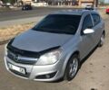 Серый Опель Астра Н, объемом двигателя 1.6 л и пробегом 169 тыс. км за 6500 $, фото 1 на Automoto.ua