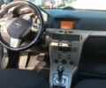 Серый Опель Астра Н, объемом двигателя 1.6 л и пробегом 160 тыс. км за 5500 $, фото 3 на Automoto.ua