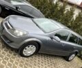 Серый Опель Астра Н, объемом двигателя 1.6 л и пробегом 246 тыс. км за 2700 $, фото 1 на Automoto.ua