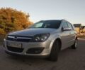 Серый Опель Астра Н, объемом двигателя 1.9 л и пробегом 198 тыс. км за 6200 $, фото 1 на Automoto.ua