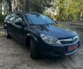 Сірий Опель Астра Н, об'ємом двигуна 1.6 л та пробігом 209 тис. км за 5650 $, фото 1 на Automoto.ua