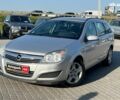 Серый Опель Астра Н, объемом двигателя 1.6 л и пробегом 208 тыс. км за 5990 $, фото 1 на Automoto.ua