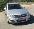Серый Опель Астра Н, объемом двигателя 1.6 л и пробегом 210 тыс. км за 6500 $, фото 5 на Automoto.ua