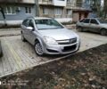 Серый Опель Астра Н, объемом двигателя 1.8 л и пробегом 165 тыс. км за 5600 $, фото 1 на Automoto.ua