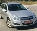 Серый Опель Астра Н, объемом двигателя 1.6 л и пробегом 210 тыс. км за 6500 $, фото 1 на Automoto.ua
