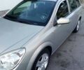 Серый Опель Астра Н, объемом двигателя 1.6 л и пробегом 219 тыс. км за 5999 $, фото 3 на Automoto.ua