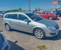 Серый Опель Астра Н, объемом двигателя 1.6 л и пробегом 290 тыс. км за 6500 $, фото 5 на Automoto.ua