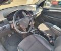 Серый Опель Астра Н, объемом двигателя 1.6 л и пробегом 290 тыс. км за 6500 $, фото 2 на Automoto.ua