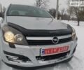 Серый Опель Астра Н, объемом двигателя 1.6 л и пробегом 160 тыс. км за 5900 $, фото 1 на Automoto.ua