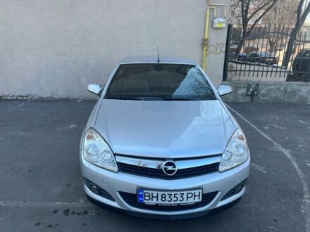 Серый Опель Астра Н, объемом двигателя 1.8 л и пробегом 247 тыс. км за 6300 $, фото 1 на Automoto.ua