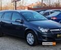 Синий Опель Астра Н, объемом двигателя 1.4 л и пробегом 205 тыс. км за 5900 $, фото 1 на Automoto.ua
