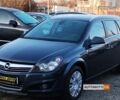 Синий Опель Астра Н, объемом двигателя 1.4 л и пробегом 205 тыс. км за 5900 $, фото 2 на Automoto.ua