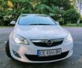 Білий Опель Астра Джей, об'ємом двигуна 1.3 л та пробігом 260 тис. км за 6650 $, фото 1 на Automoto.ua