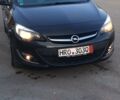 Чорний Опель Астра Джей, об'ємом двигуна 2 л та пробігом 210 тис. км за 7999 $, фото 1 на Automoto.ua