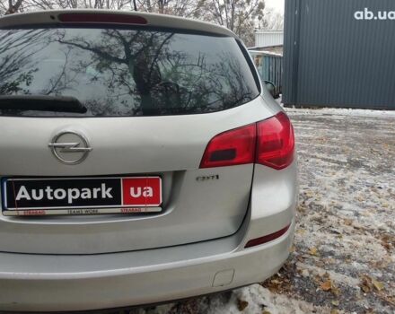 Серый Опель Астра Джей, объемом двигателя 17 л и пробегом 329 тыс. км за 8690 $, фото 8 на Automoto.ua