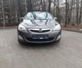 Сірий Опель Астра Джей, об'ємом двигуна 1.6 л та пробігом 250 тис. км за 7490 $, фото 1 на Automoto.ua