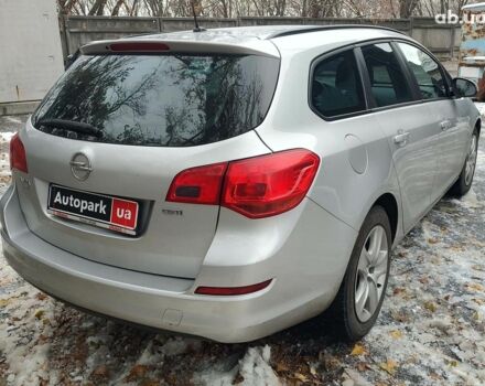 Серый Опель Астра Джей, объемом двигателя 17 л и пробегом 329 тыс. км за 8690 $, фото 5 на Automoto.ua