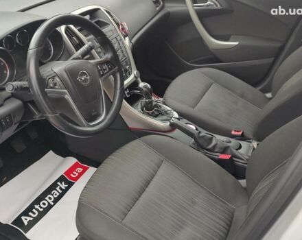 Серый Опель Астра Джей, объемом двигателя 17 л и пробегом 329 тыс. км за 8690 $, фото 11 на Automoto.ua