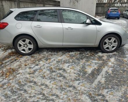 Серый Опель Астра Джей, объемом двигателя 17 л и пробегом 329 тыс. км за 8690 $, фото 6 на Automoto.ua