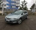 Сірий Опель Астра Джей, об'ємом двигуна 1.7 л та пробігом 250 тис. км за 9300 $, фото 1 на Automoto.ua