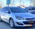 Серый Опель Астра Джей, объемом двигателя 1.7 л и пробегом 244 тыс. км за 8300 $, фото 1 на Automoto.ua