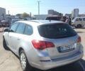 Серый Опель Астра Джей, объемом двигателя 1.7 л и пробегом 165 тыс. км за 10000 $, фото 6 на Automoto.ua