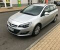 Сірий Опель Астра Джей, об'ємом двигуна 2 л та пробігом 124 тис. км за 11250 $, фото 1 на Automoto.ua