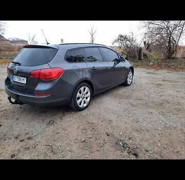 Серый Опель Астра Джей, объемом двигателя 1.6 л и пробегом 248 тыс. км за 6550 $, фото 1 на Automoto.ua