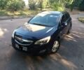 Синій Опель Астра Джей, об'ємом двигуна 1.3 л та пробігом 180 тис. км за 8399 $, фото 1 на Automoto.ua