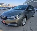 Сірий Опель Астра К, об'ємом двигуна 1.6 л та пробігом 181 тис. км за 11490 $, фото 1 на Automoto.ua