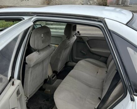 Белый Опель Астра, объемом двигателя 1.6 л и пробегом 300 тыс. км за 950 $, фото 2 на Automoto.ua