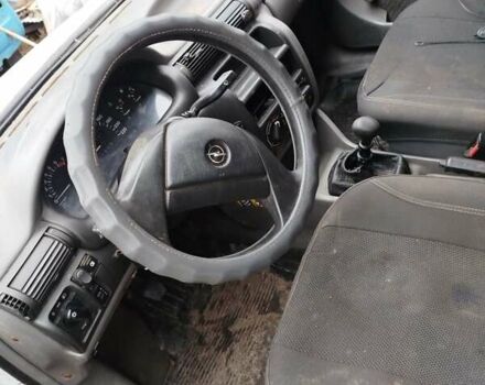 Белый Опель Астра, объемом двигателя 1.4 л и пробегом 123 тыс. км за 650 $, фото 1 на Automoto.ua