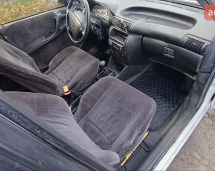 Білий Опель Астра, об'ємом двигуна 1.6 л та пробігом 296 тис. км за 1300 $, фото 9 на Automoto.ua