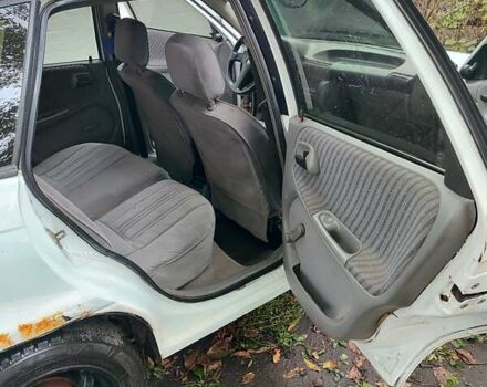 Белый Опель Астра, объемом двигателя 1.4 л и пробегом 312 тыс. км за 1100 $, фото 11 на Automoto.ua