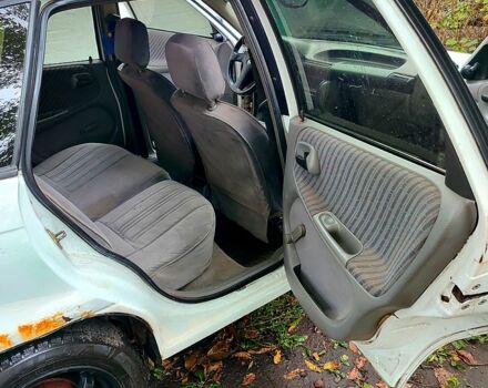 Белый Опель Астра, объемом двигателя 1.4 л и пробегом 312 тыс. км за 1100 $, фото 6 на Automoto.ua