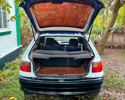 Белый Опель Астра, объемом двигателя 1.4 л и пробегом 312 тыс. км за 1100 $, фото 2 на Automoto.ua