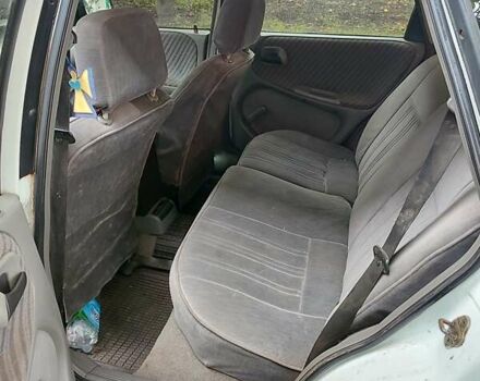 Белый Опель Астра, объемом двигателя 1.4 л и пробегом 312 тыс. км за 1100 $, фото 13 на Automoto.ua