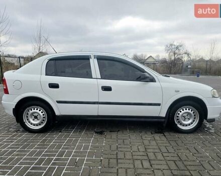 Белый Опель Астра, объемом двигателя 1.2 л и пробегом 263 тыс. км за 2999 $, фото 9 на Automoto.ua