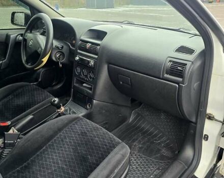 Белый Опель Астра, объемом двигателя 1.2 л и пробегом 263 тыс. км за 2999 $, фото 10 на Automoto.ua