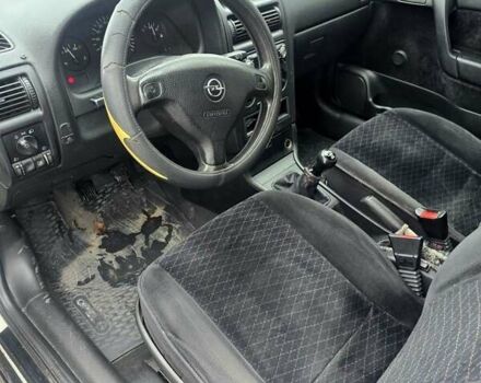 Белый Опель Астра, объемом двигателя 1.2 л и пробегом 263 тыс. км за 2999 $, фото 15 на Automoto.ua