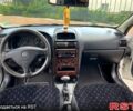 Белый Опель Астра, объемом двигателя 2 л и пробегом 240 тыс. км за 3400 $, фото 11 на Automoto.ua