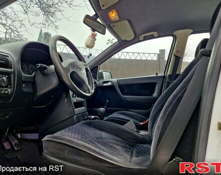 Білий Опель Астра, об'ємом двигуна 1.4 л та пробігом 370 тис. км за 2400 $, фото 3 на Automoto.ua