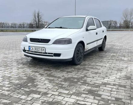 Белый Опель Астра, объемом двигателя 1.2 л и пробегом 235 тыс. км за 3400 $, фото 1 на Automoto.ua