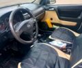 Білий Опель Астра, об'ємом двигуна 1.4 л та пробігом 180 тис. км за 3800 $, фото 7 на Automoto.ua