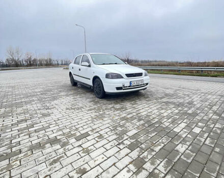Белый Опель Астра, объемом двигателя 1.2 л и пробегом 235 тыс. км за 3400 $, фото 4 на Automoto.ua