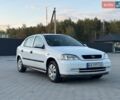 Белый Опель Астра, объемом двигателя 1.2 л и пробегом 319 тыс. км за 2499 $, фото 1 на Automoto.ua