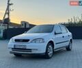 Белый Опель Астра, объемом двигателя 1.2 л и пробегом 319 тыс. км за 2499 $, фото 2 на Automoto.ua