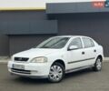 Білий Опель Астра, об'ємом двигуна 1.2 л та пробігом 319 тис. км за 1700 $, фото 1 на Automoto.ua
